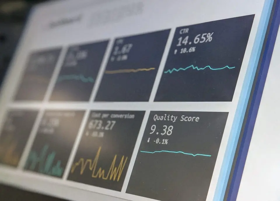 Analytics dashboards displaying performance metrics on a screen